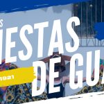 Tres personas con trajes festivos posan sosteniendo faldas de colores. Texto: Fiestas Aniversarias Fiestas de Guática, 22/04/1921, Tercera semana de noviembre, y Biblioteca Pública Comfamiliar Guática.