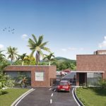 Montebonito Apartamentos es un moderno complejo residencial cerrado con edificios de ladrillo, un coche rojo en la entrada, palmeras y exuberante vegetación bajo un cielo azul salpicado de nubes y pájaros volando.