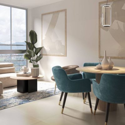 Una moderna zona de estar y comedor con un sofá beige, una mesa de centro redonda, una planta grande y obras de arte abstractas en la pared crean un ambiente reservado. Una mesa de comedor redonda con cuatro sillas de color verde azulado se sitúa bajo una lámpara colgante mientras la luz natural entra por las ventanas que dan a Serranías.